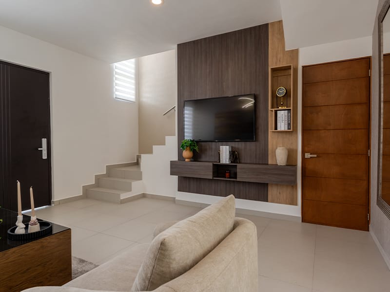 Sala con TV del modelo Zafiro en el fraccionamiento Allegro de la inmobiliaria Javer