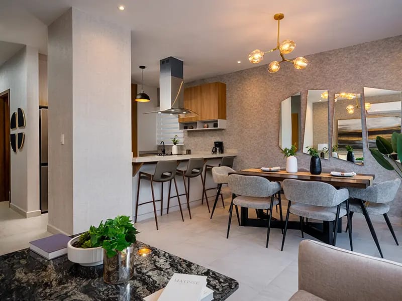Sala con Comedor y cocina en el modelo Aura Elite 2N del fraccionamiento Bosques de la Sierra en inmobiliaria Javer de Nuevo León